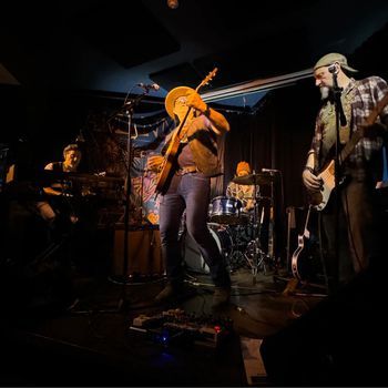 Amann and The Wayward Sons logo